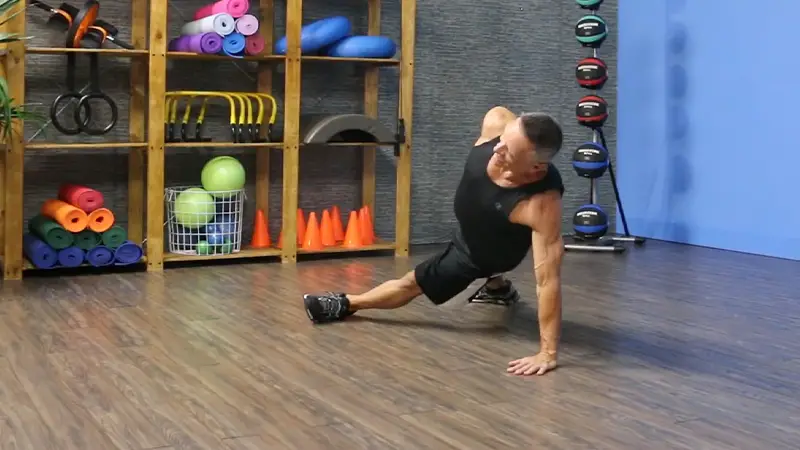 Scissor Legs Plank