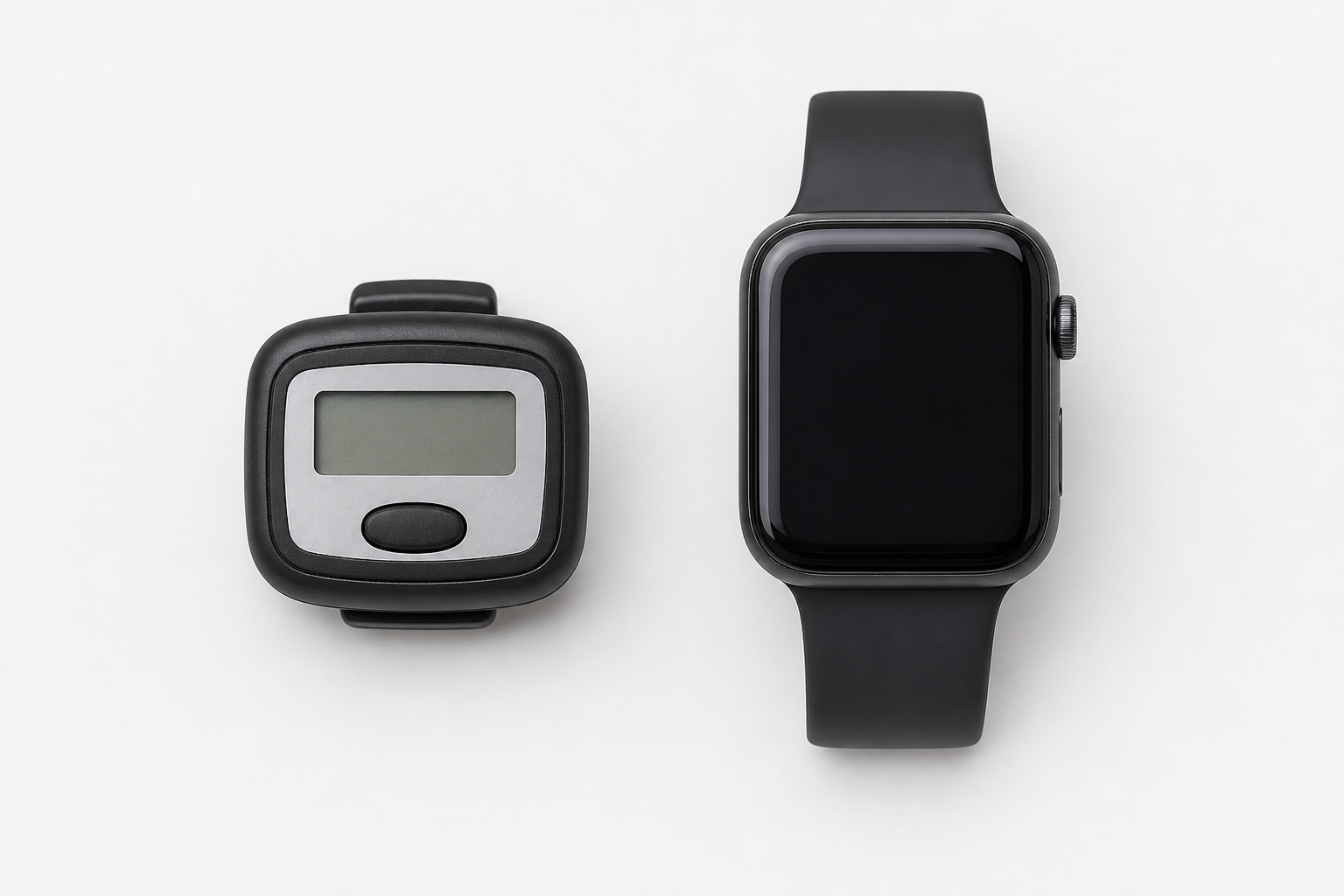 A simple pedometer placed next to a smartwatch on a white surface for comparison